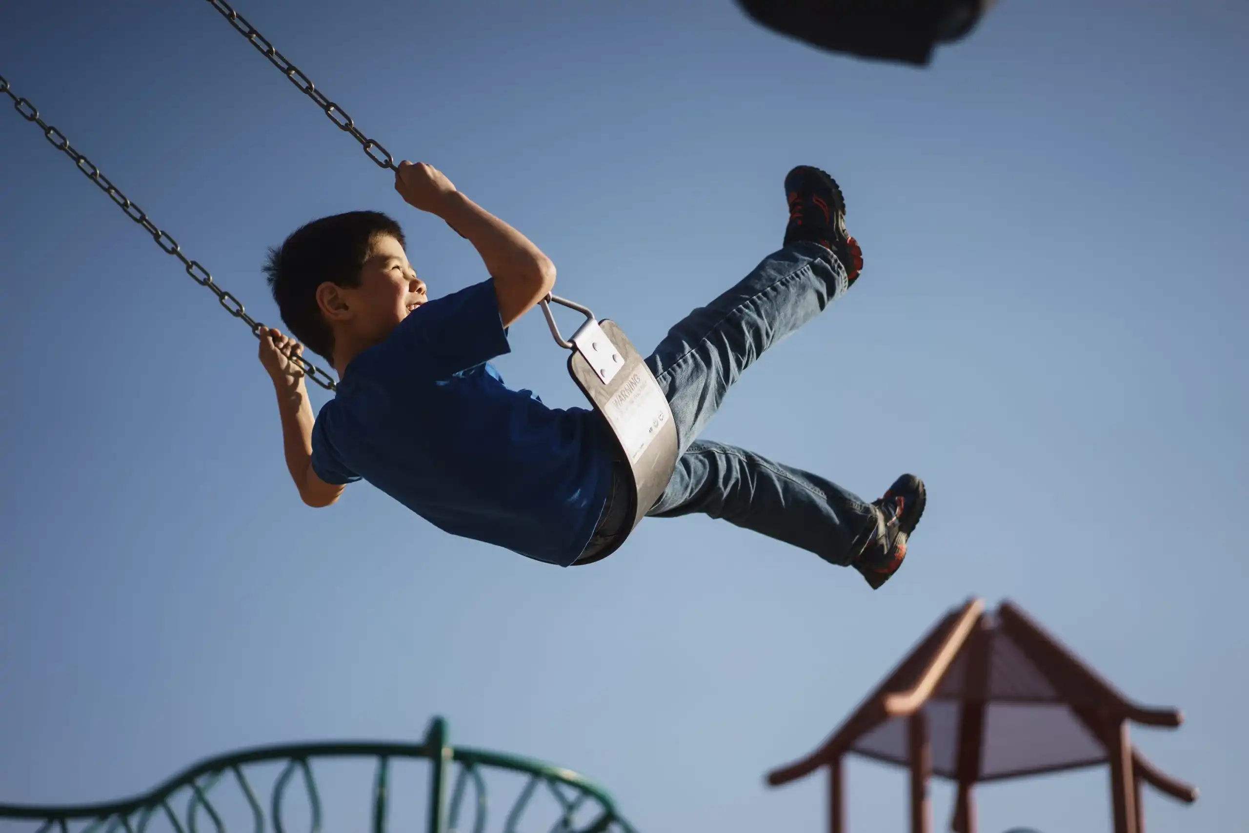 Chiropractic Anaheim CA Child on Swing