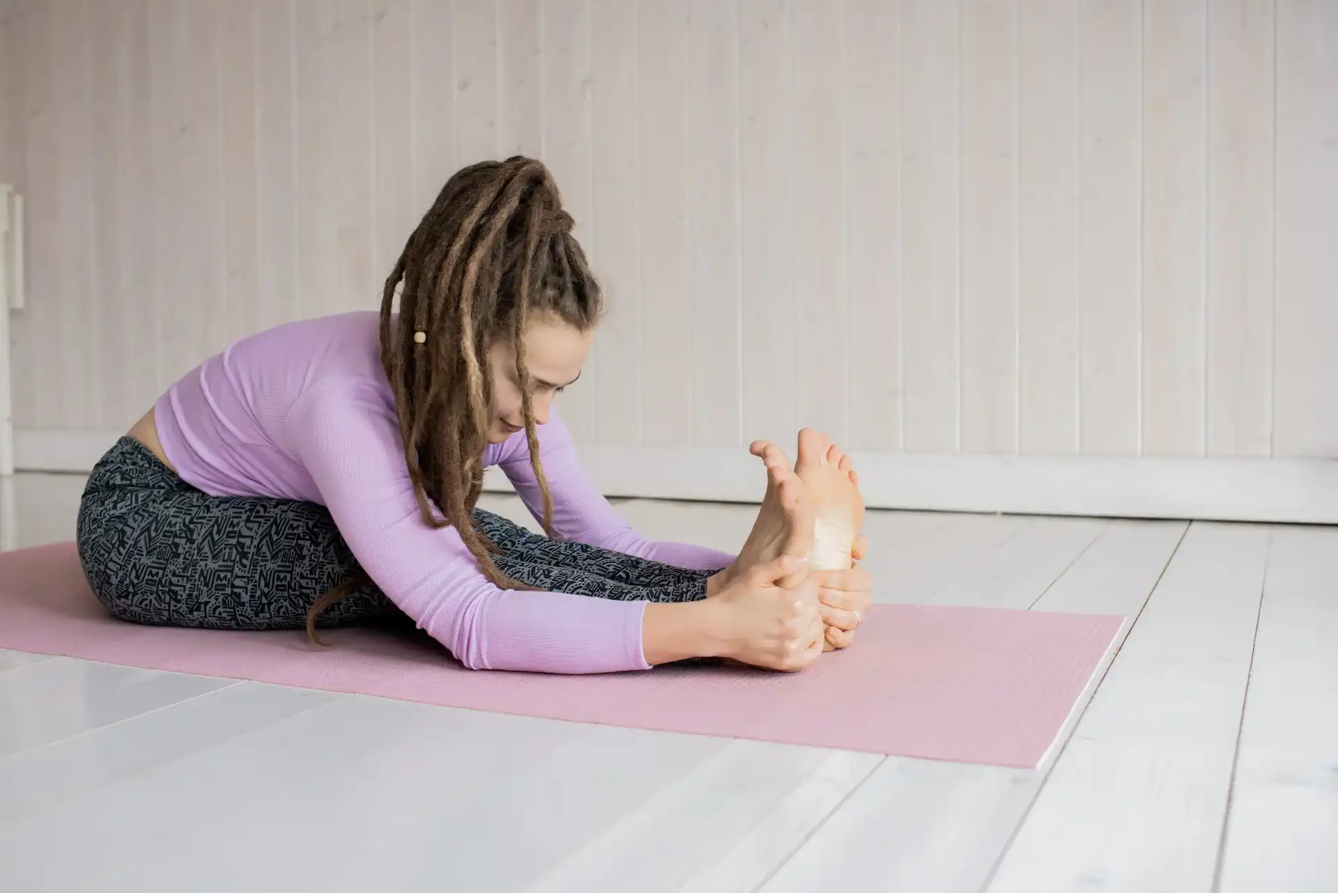 Chiropractic Anaheim CA Woman Sit Reach Stretch